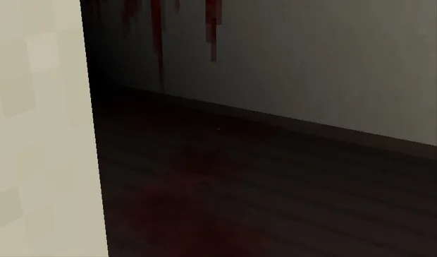 Blood running down a pale wall onto a dark wooden floor