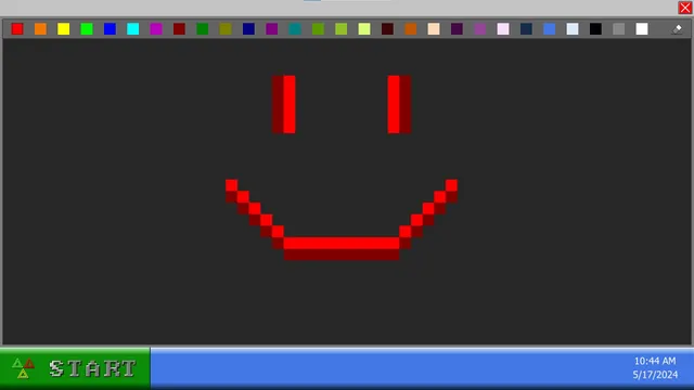 Pixel Paint with a red pixel smiley face drawn on a black canvas
