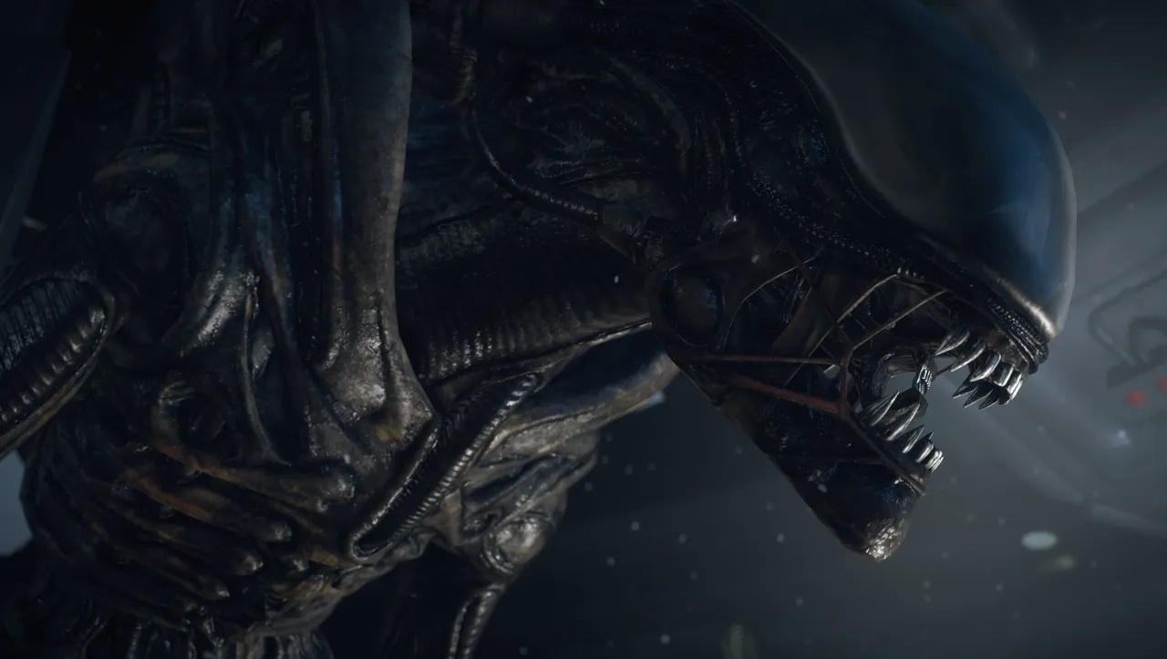 Alien: Isolation screenshot: the alien's ridged head and jaws close up in the dark