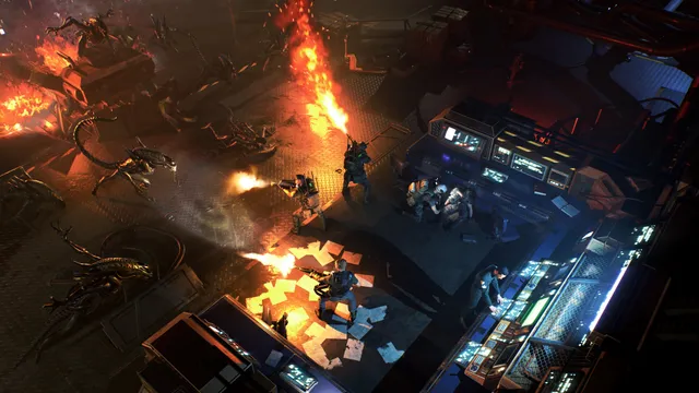 Aliens: Dark Descent screenshot: marines fire rifles and a flamethrower at charging Xenomorphs on a burning deck while one works a console