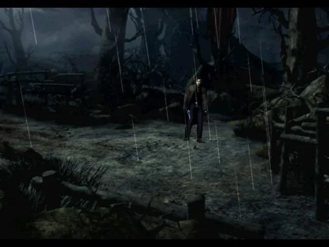 Alone in the Dark: The New Nightmare screenshot: Carnby stands with a pistol in the rain on a path through a dead forest