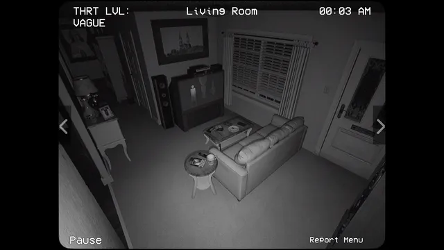 Alternate Watch screenshot: a camera view of a living room with a sofa, a TV and a door at 00:03 AM