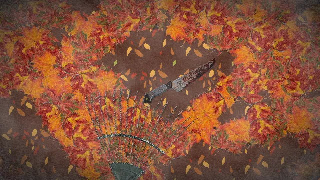 A rake among bright orange autumn leaves has uncovered a bloodstained kitchen knife on the bare ground