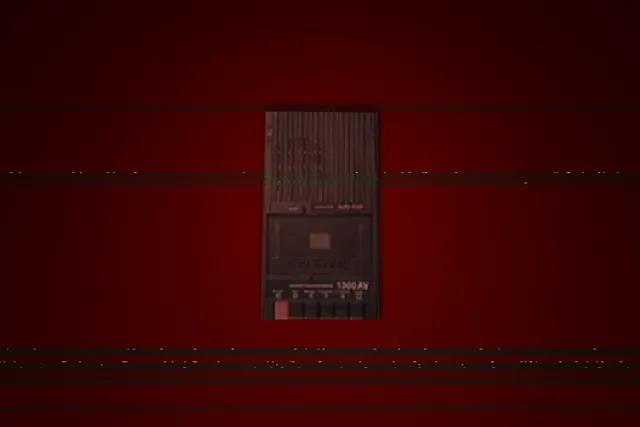 An old cassette tape recorder against a deep red background crossed by glitch lines