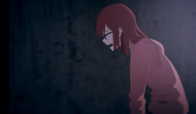 An animated cutscene frame of Ann hunched forward in the dark, her face hidden by her hair