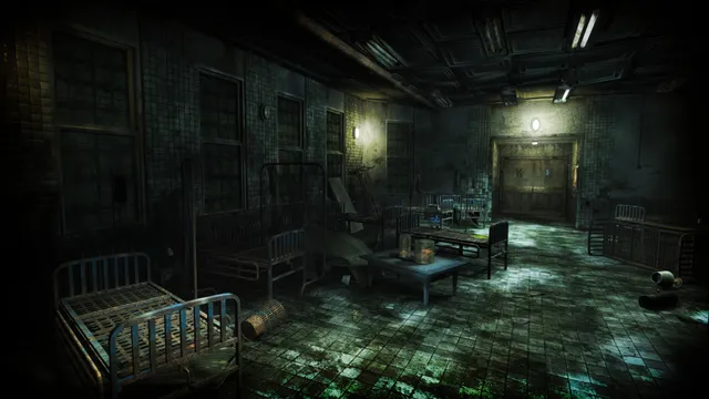 An abandoned hospital ward of iron beds and tables on a stained tiled floor