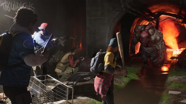 Back 4 Blood screenshot: Cleaners with guns and a baseball bat face a hulking mutated Ridden in a burning sewer tunnel