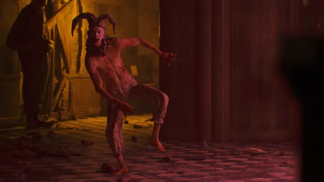 A red-lit room with a jester-like monster in a horned hat crouching