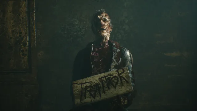 A burned, bloody corpse holding a wooden sign that reads Traitor