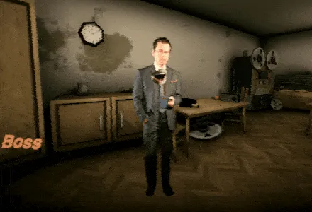 A man in a grey suit, labelled Boss, stands in a shabby office with a film projector