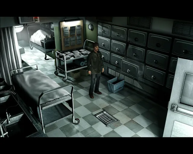 Black Mirror II screenshot: Darren in a cold, tiled room lined with metal drawers like a morgue, beside an empty hospital bed