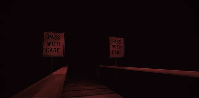 A dark wooden bridge at night between two Pass With Care signs, lit a dim red
