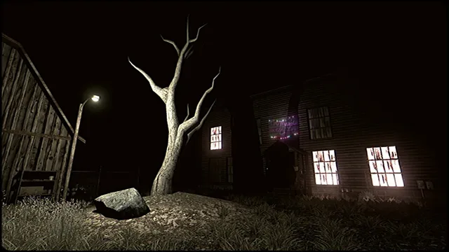 A dead tree and a farmhouse at night, with light glowing through its windows