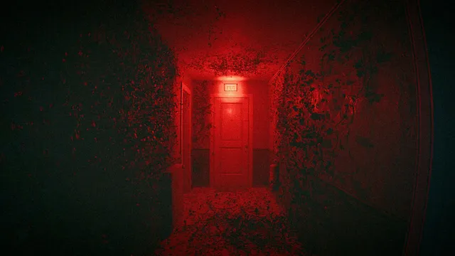 An apartment corridor drowned in red light, its walls overgrown, leading to a door under an exit sign