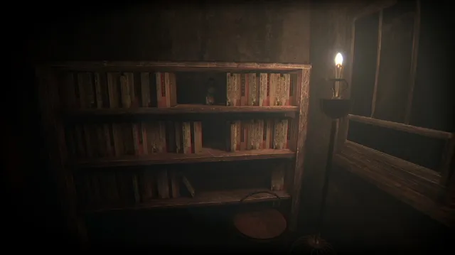 Onryo screenshot: a candle lit bookcase of Japanese books with a small doll on a shelf