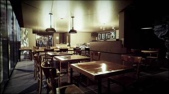 The empty cafe after hours, wooden tables under hanging lamps and a dark window wall