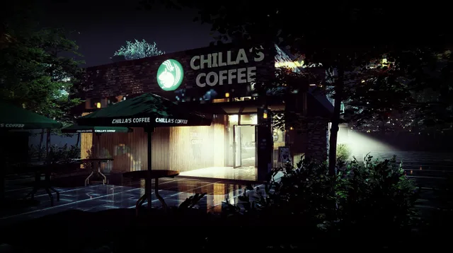 Chilla's Coffee at night, its terrace umbrellas and lit windows framed by dark trees