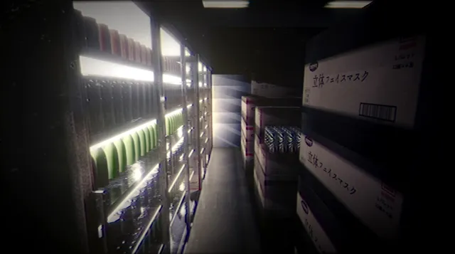 A dim stockroom aisle between glowing drink fridges and stacked cardboard boxes with Japanese labels