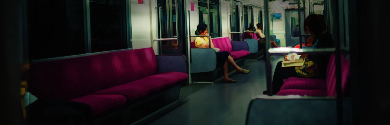 The Ghost Train key art: the inside of a Japanese commuter train with pink seats and a few passengers in dim light