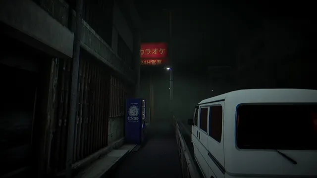 A narrow street at night with a parked white van and the karaoke sign glowing red ahead