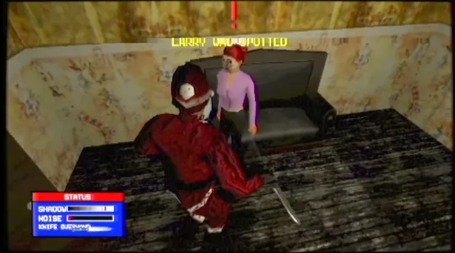 Larry in his Santa suit creeping up behind a woman on a couch with a knife