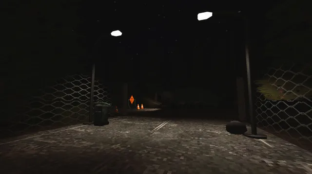 Cleaning Redville screenshot: a dark street between chain-link fences with a bin and traffic cones under streetlights