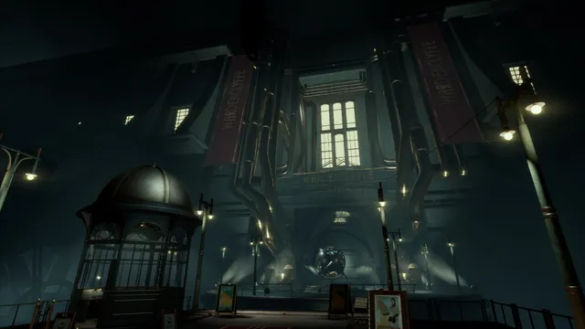 The dark entrance hall of the Helios with Wardenclyffe banners, huge pipes and a ticket kiosk