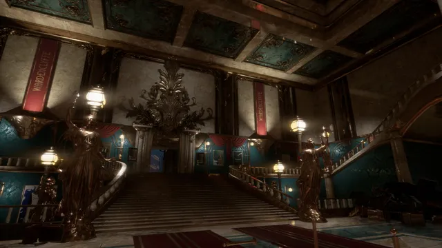 A grand art deco staircase hall with gilded statues and red Wardenclyffe banners, empty