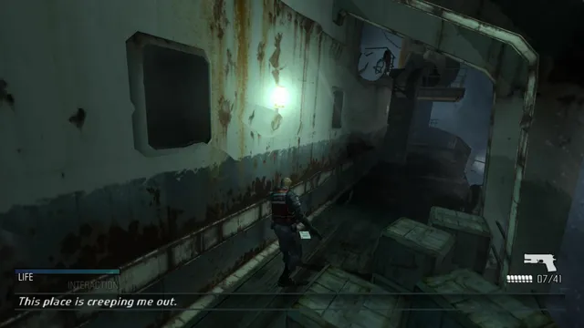 Cold Fear screenshot: Hansen moves between crates along a rusted, rain-streaked passage on the ship, with the line This place is creeping me out