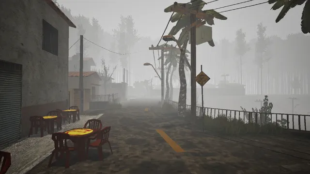 An empty street of a fog-covered town with plastic café chairs, palm trees and power lines