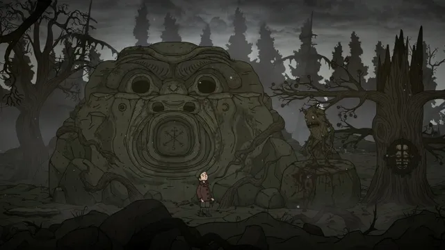 Martin stands before a huge carved stone face in a misty, dead forest