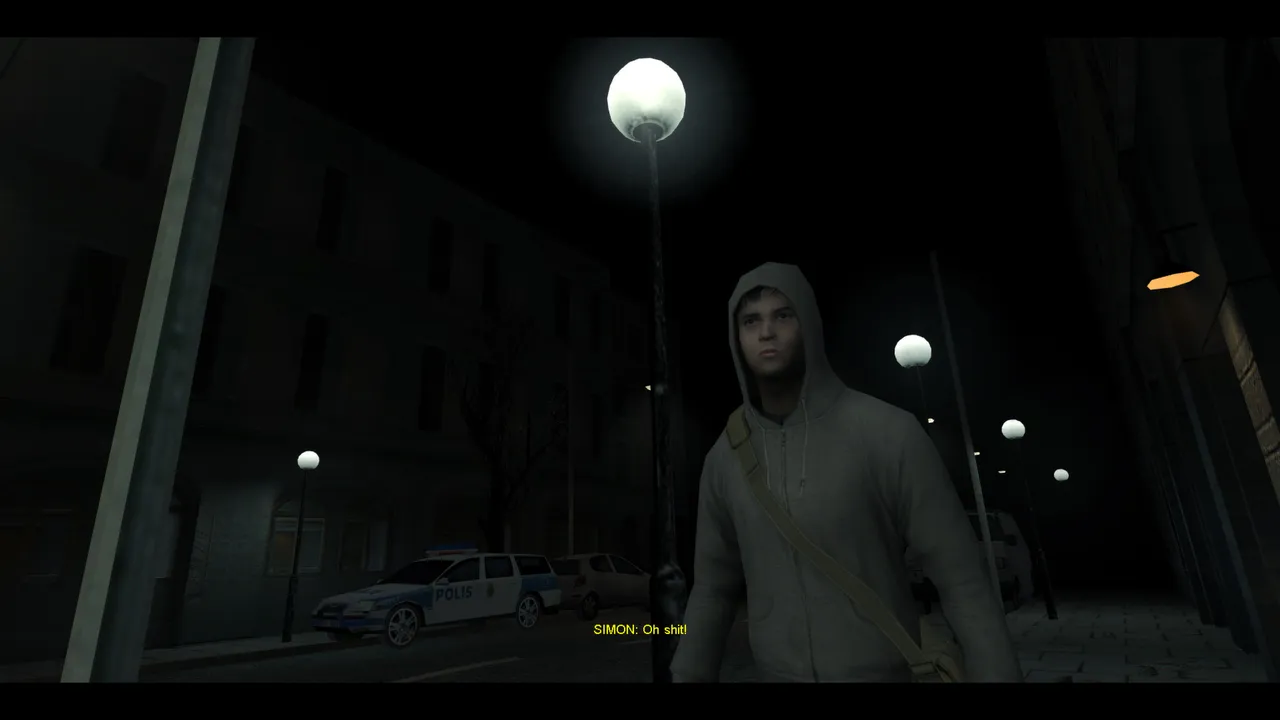 Cry of Fear screenshot: a young man in a white hoodie stands under a street lamp on a dark town street with a police car behind him