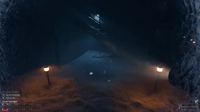 CRYO screenshot: a frozen path lit by two lamps outside the facility at night