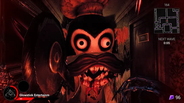 A grinning cartoon monkey chef with bloody teeth looming in a red hotel corridor, a maze map in the corner