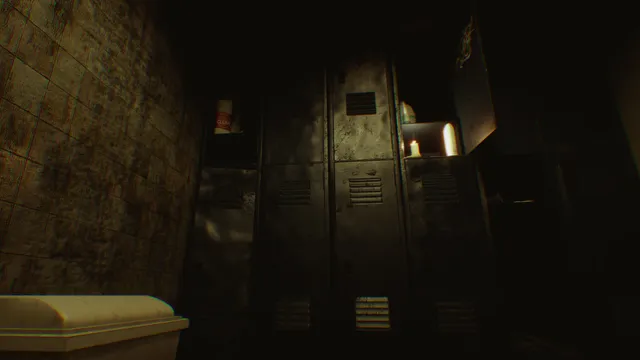 Dented metal lockers in a dark locker room, a candle burning on an open shelf