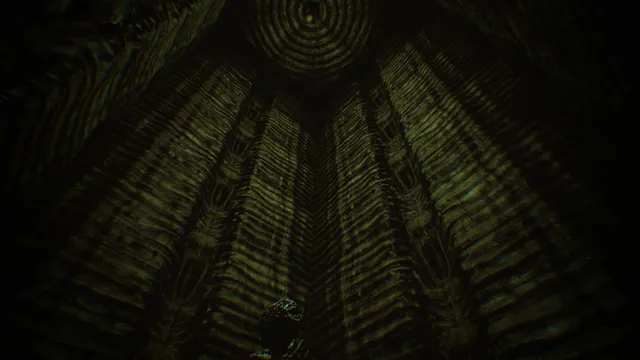 A towering ribbed chamber of Giger-like organic architecture in Edward's nightmare world