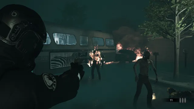 Daymare: 1998 screenshot: a soldier aims at burning mutated townspeople beside a crashed bus at night