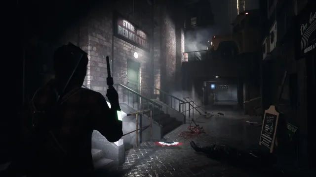 Daymare: 1998 screenshot: a man in a flannel shirt aims a pistol down a dark, bloodied alley in the town