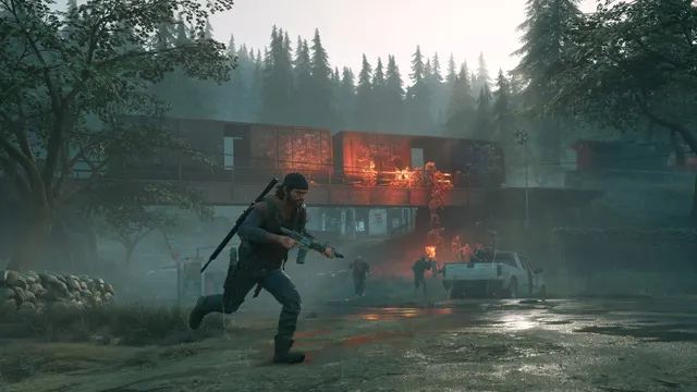 Days Gone screenshot: Deacon runs with a rifle past a burning freight car in the woods
