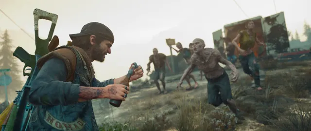 Days Gone screenshot: Deacon readies a molotov as pale Freakers charge at him