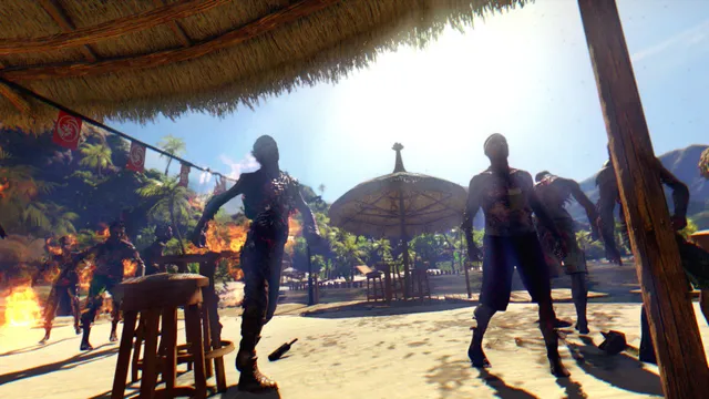 Burning zombies stagger across the sand near a thatched beach bar