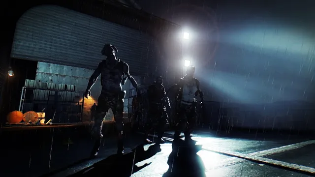 Dead Island: Riptide screenshot: zombies lurch out of the rain at night under floodlights