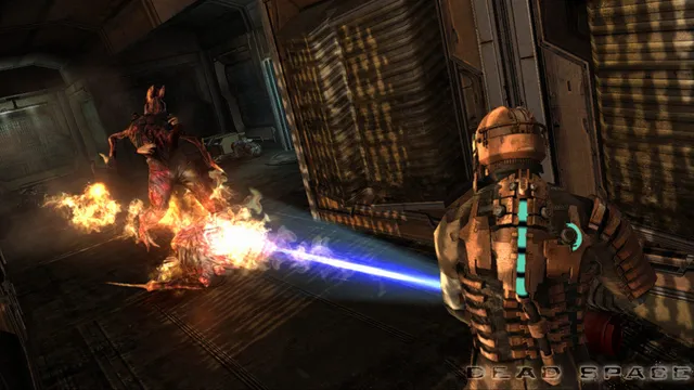Isaac turns a flame weapon on a Necromorph in a dark corridor of the Ishimura