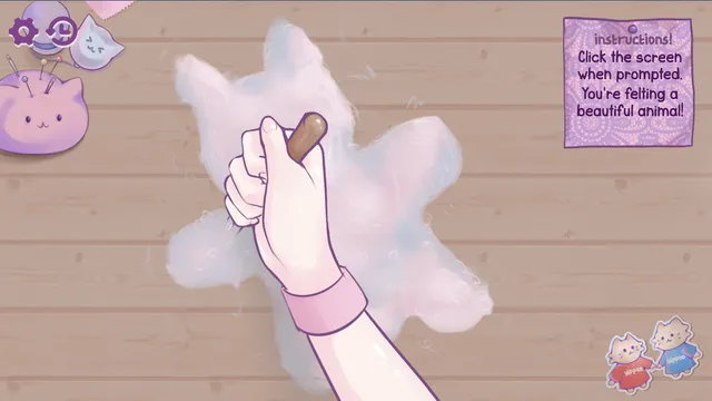 Dermimi's! screenshot: the felting minigame, a hand with a needle shaping a fluffy blue animal on a wooden table