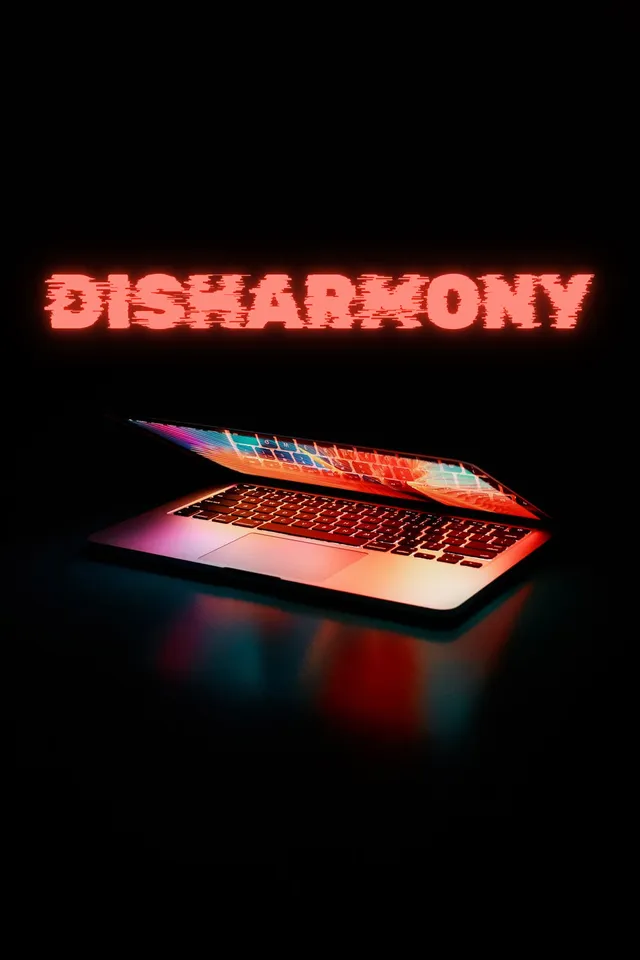Disharmony cover: a half-open laptop glowing red and orange in the dark under the glitching title
