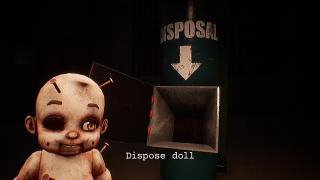 A dirty baby doll with one dark eye and nails in its head held up next to a disposal chute