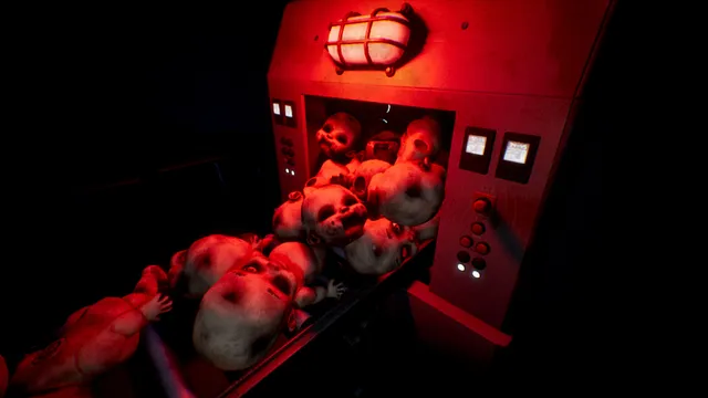 A red-lit machine spilling a heap of doll heads