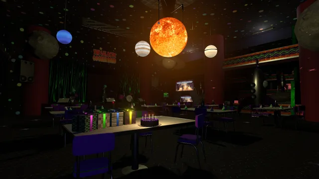 The dark party hall of Outpost 3000, with planets hanging from the ceiling over a table with a birthday cake and presents