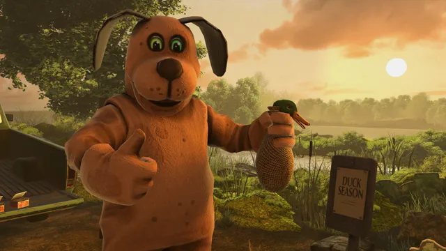 Duck Season: the game's dog mascot, a man-sized cartoon hound, holds up a duck and gives a thumbs up by the lake