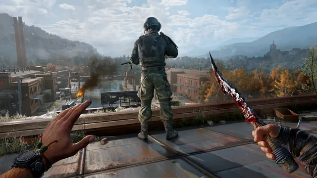 Dying Light: The Beast screenshot: the player holds a bloody knife on a rooftop behind an armed soldier, looking over a valley of brick buildings